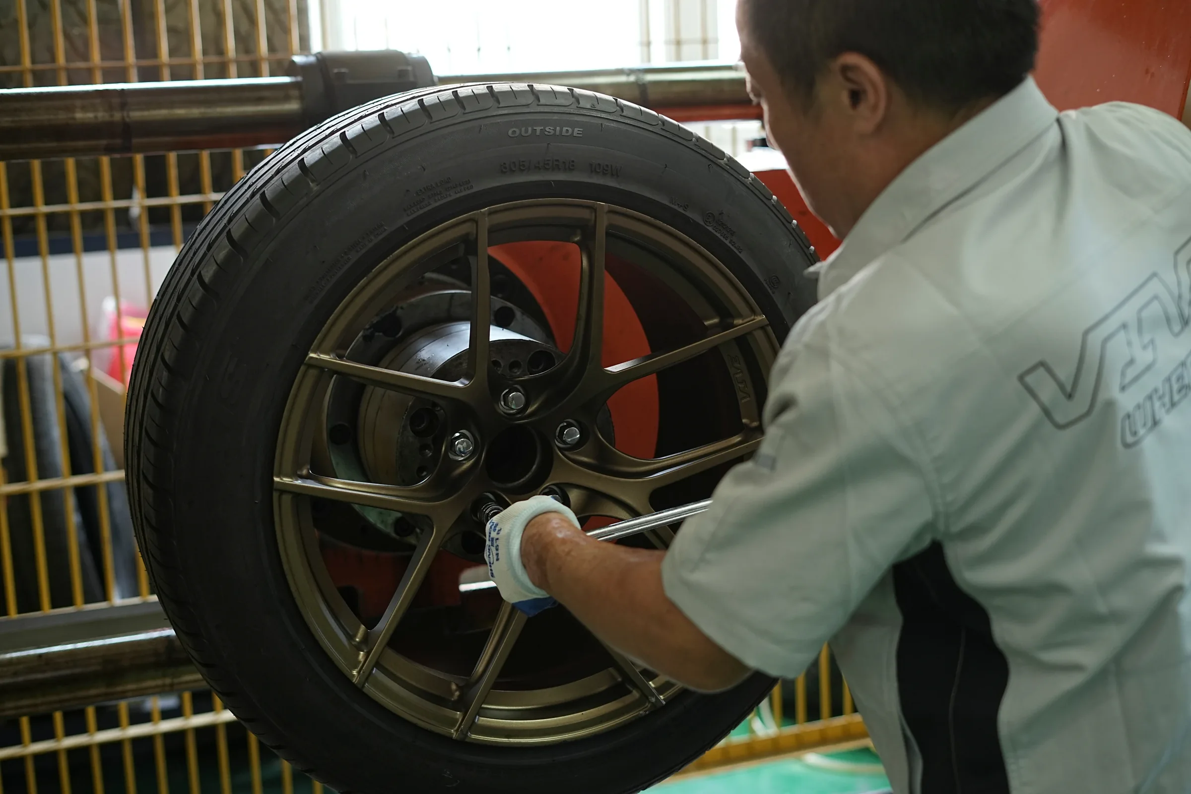 Technician installing a VIVE forged wheel
