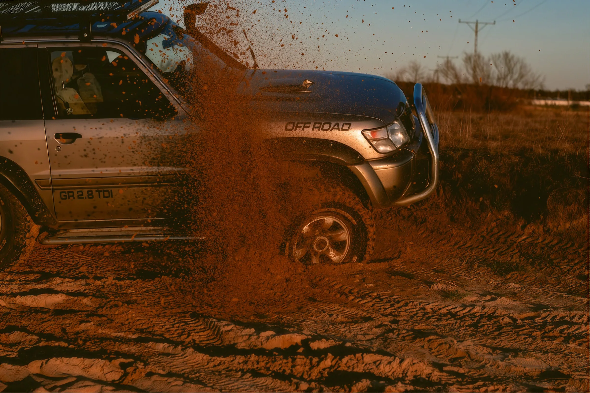 VIVE-equipped off-road truck driving through mud