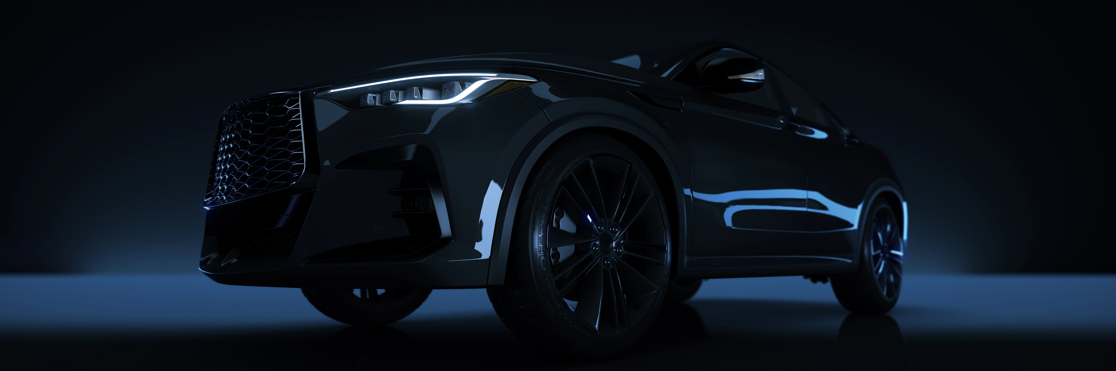 Performance car and wheels in a dark studio